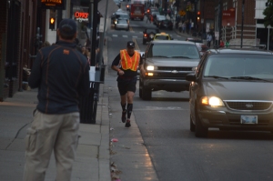 Pat Sullivan runs through downtown Nashville towards finish line